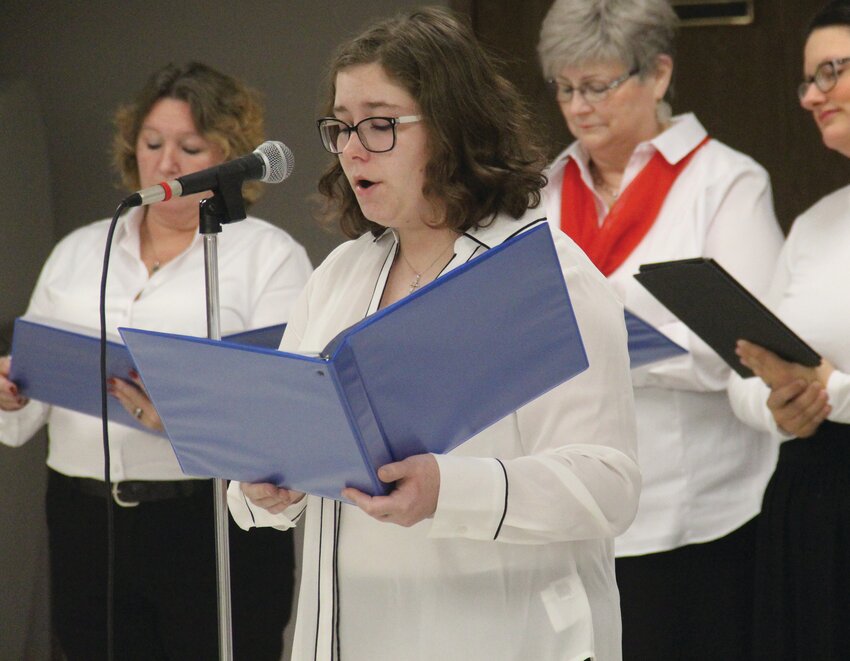 A soloist performs during the community choir's presentation of &quot;A Night to Remember: A Journey of a Little Drummer Boy.&quot;