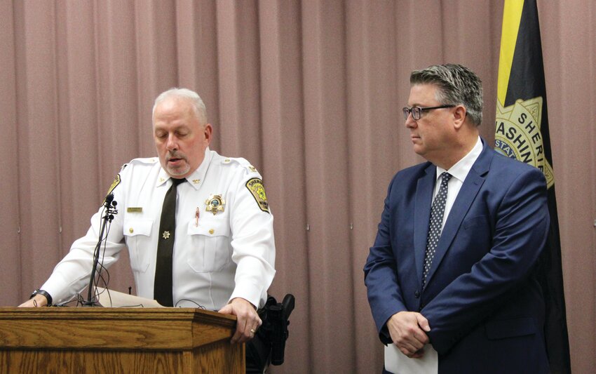 Sheriff Mike Robinson, left, speaks to members of the media during a press conference regarding the Kierre Williams homicide case at the Washington County Courthouse Thursday. Scott Vander Schaaf, Washington County attorney, also addressed the media during the conference.