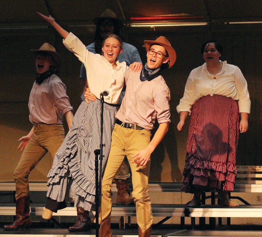 Missouri Valley's show choir had a theme of the Old West as it depicted the westward expansion. Pictured are Natalya Trovato and Sebastian Caniglia.