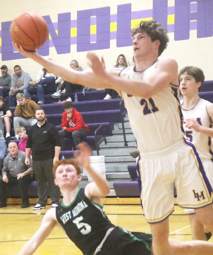 Logan-Magnolia's Evan Roden powers his way to the basket in a non-conference win over West Monona on Jan. 2 in Logan.