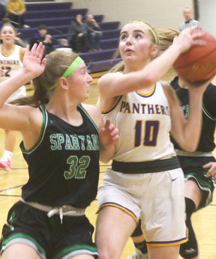 Logan-Magnolia's Brooklyn Lally eyes the basket in non-conference play vs. West Monona on Jan. 2 in Logan.