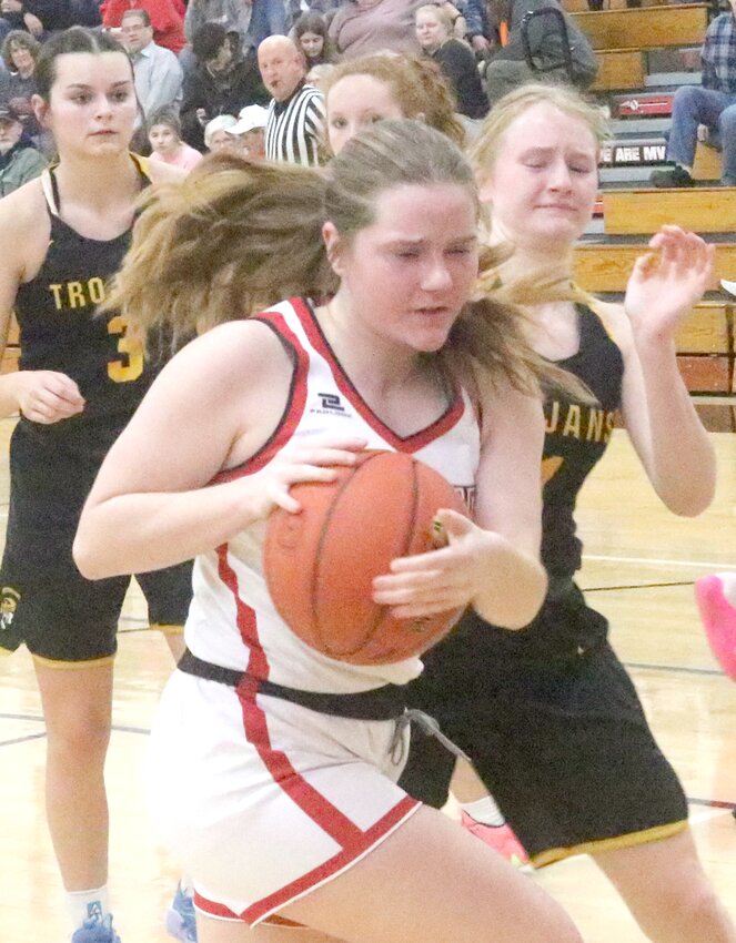 Missouri Valey's Emerson Anderson grabs a rebound and battles for position in Western Iowa Conference action against Tri-Center on Jan. 26.