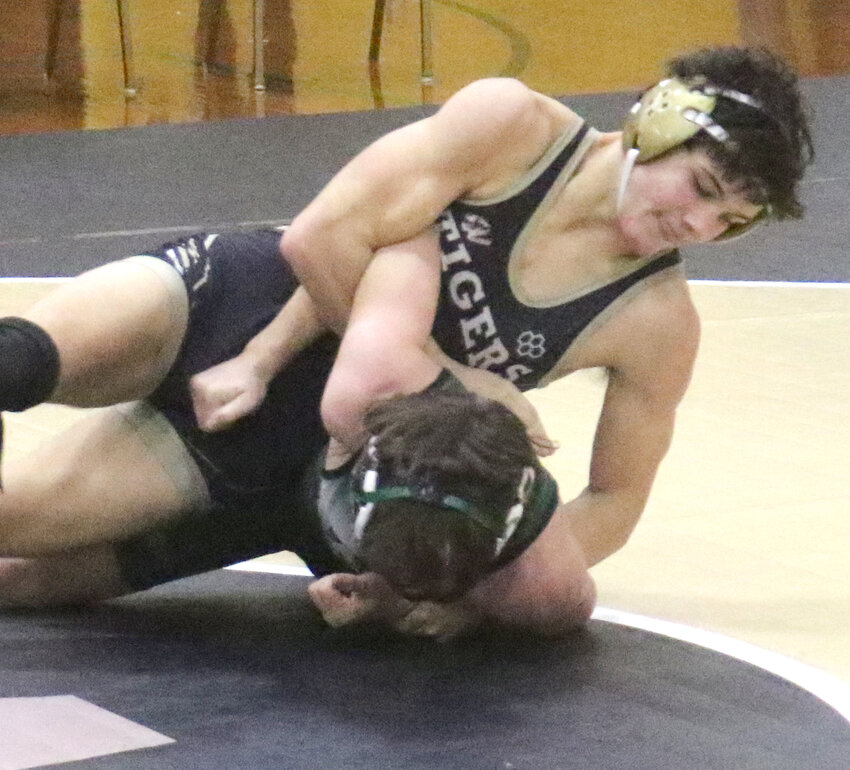 Woodbine's Brenner Sullivan turns his opponent during a match from earleir this season.  The Tigers will be at the Class 1A District in Mapleton on Feb. 10.