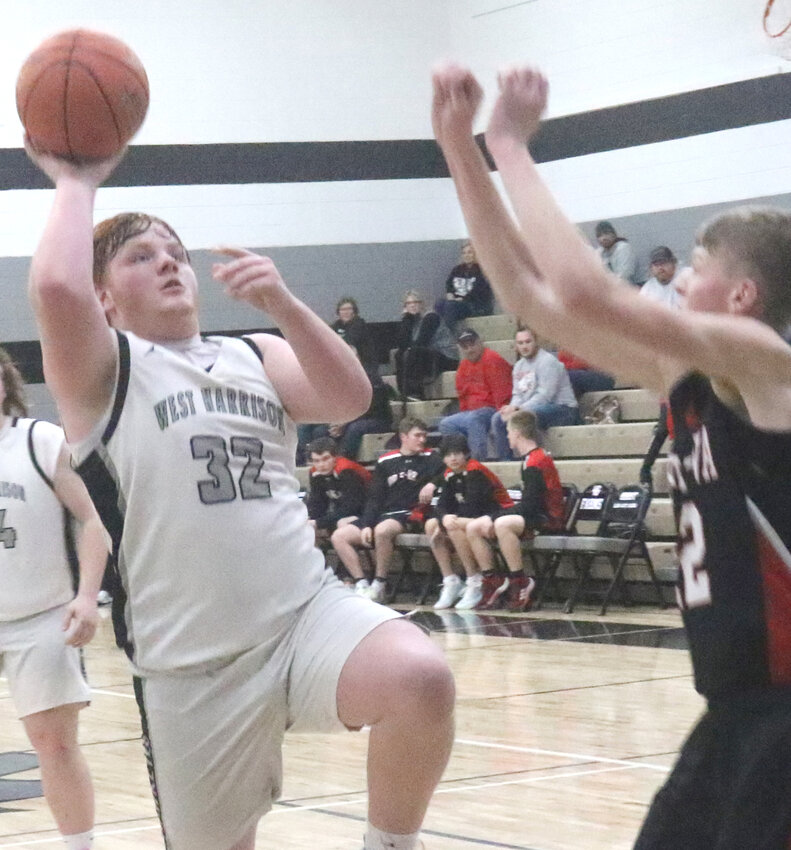 WH's Jason Barry puts up a shot attempt in Rolling Valley Conference play against Ar-We-Va on Jan. 29 in Mondamin.