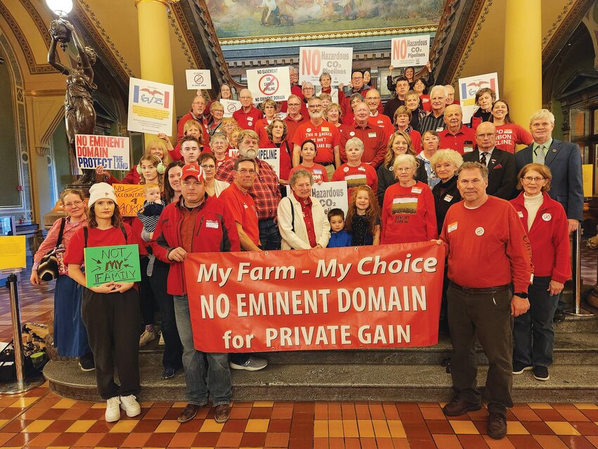 A rally protesting the pipeline was held at the State Capitol in Des Moines in early February. Sherri Webb can be seen in red above the word &quot;choice.&quot; Tim Baughman is directly in the center with glasses and facial hair.
