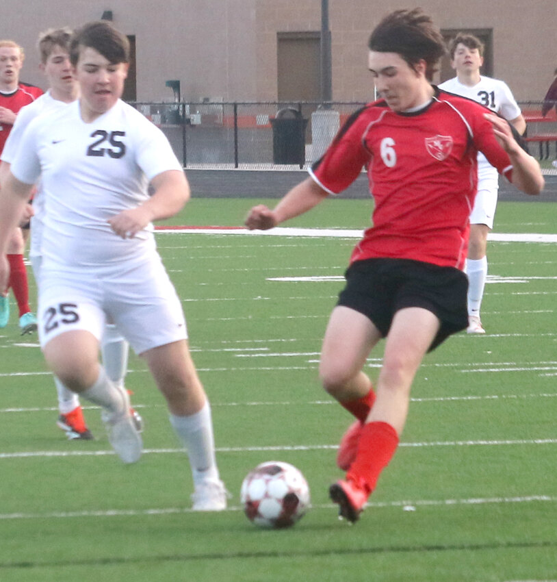 Missouri Valley's Theron Felner (6) looks to control the possession in Western Iowa Conference play against Treynor on April 5 in Missouri Valley.