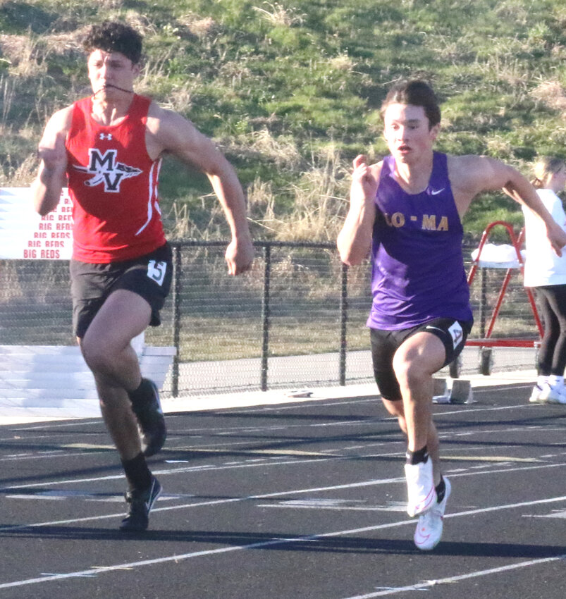 Missouri Valley's Chris Dworak and Logan-Magnolia's Will Anderson start fast in the 100 m dash at the Big Reds Relays on April 4 in Missouri Valley.