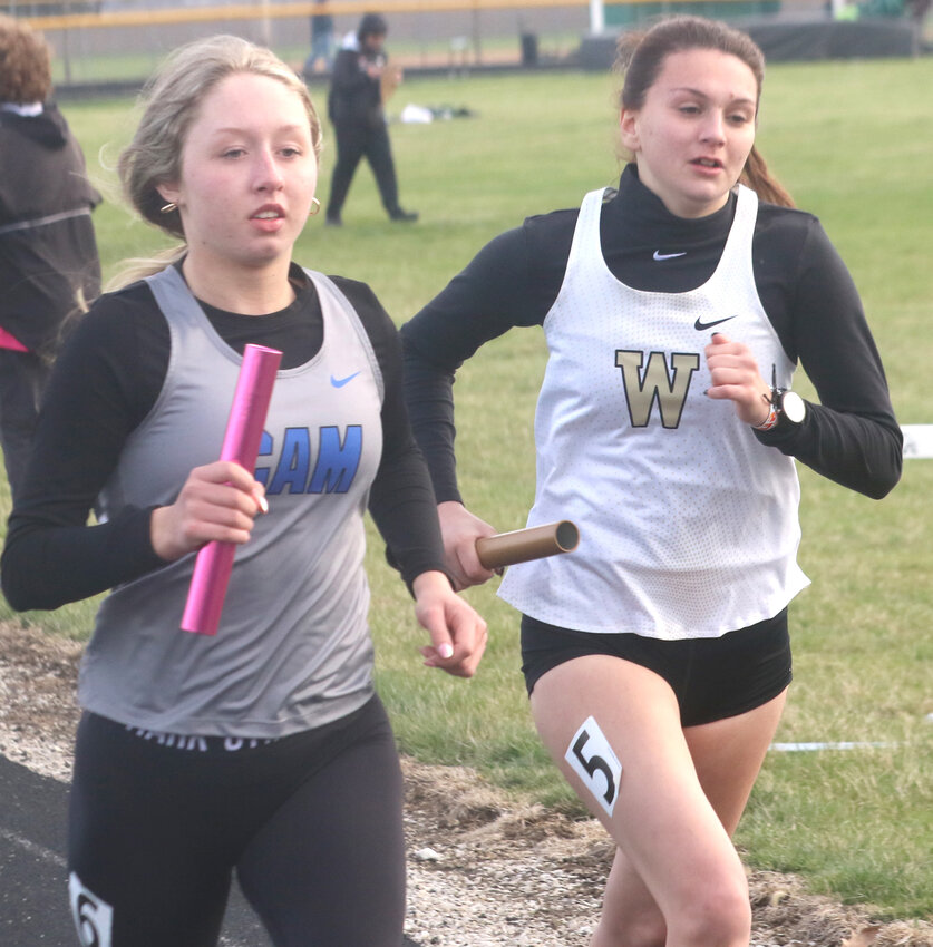Woodbine's Addyson Lapel runs the final leg of the distance medley relay at the Gregg Beam Invitational on April 19 in Mondamin.