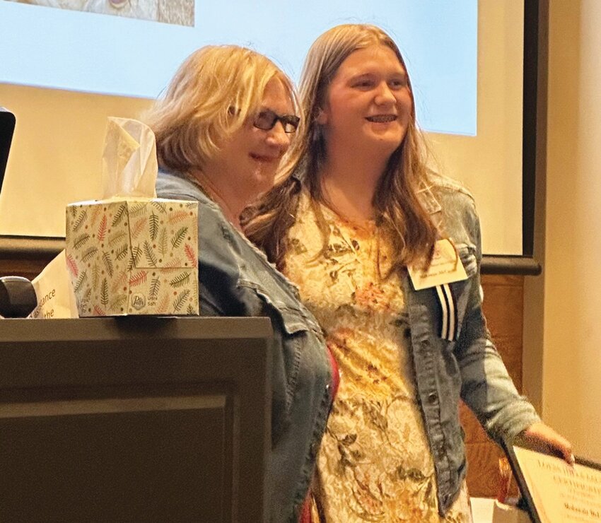 Pictured, from left: Jan Creasman, President of AAUW Loess Hills branch, and Makensie McCurley.