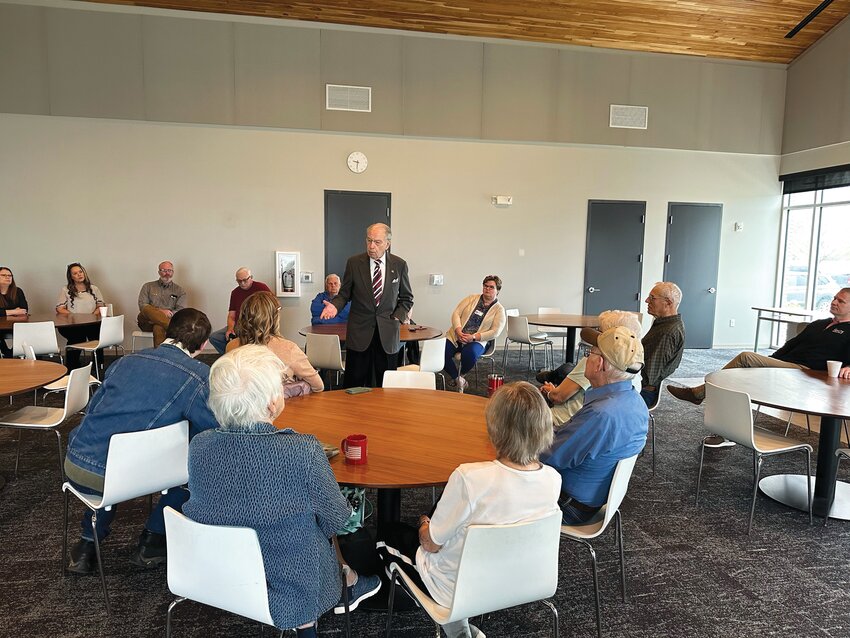 Grassley discusses issues with members of Main Street Woodbine at the CREW Center last week.