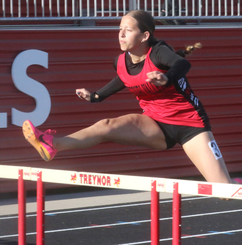 Missouri Valley's Hailey Ferris runs the final leg of the shuttle hurdle relay at the Class 2A State Qualifying Meet on May 9 at Treynor.
