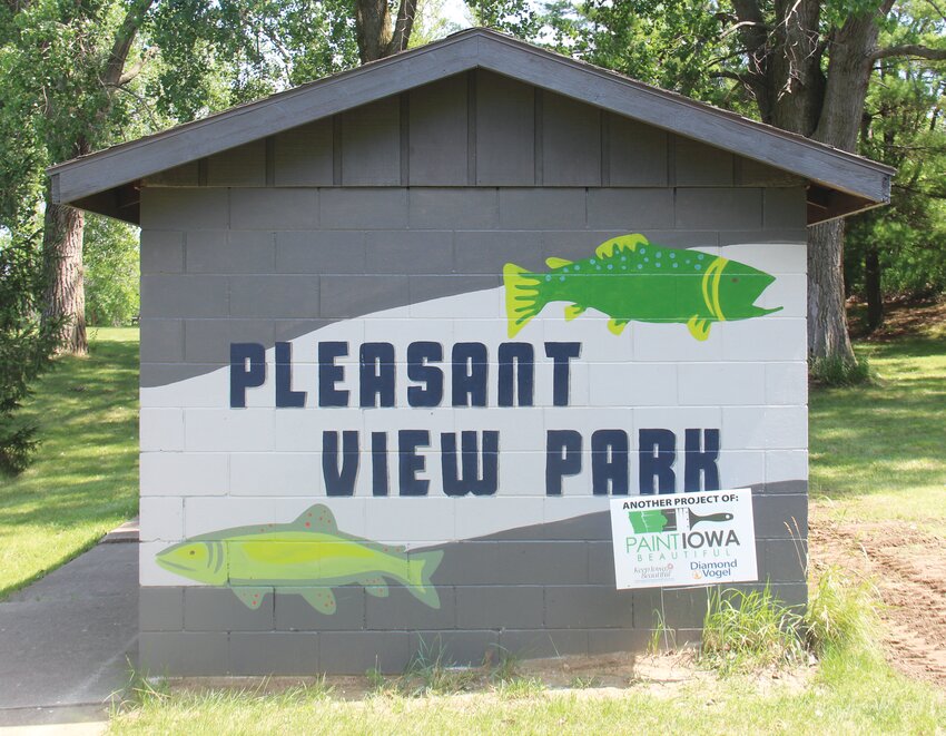 The restrooms at Pleasant View Park have a fresh mural, utilizing funding from the Paint Iowa Beautiful grant. Deb Heller also helped paint.