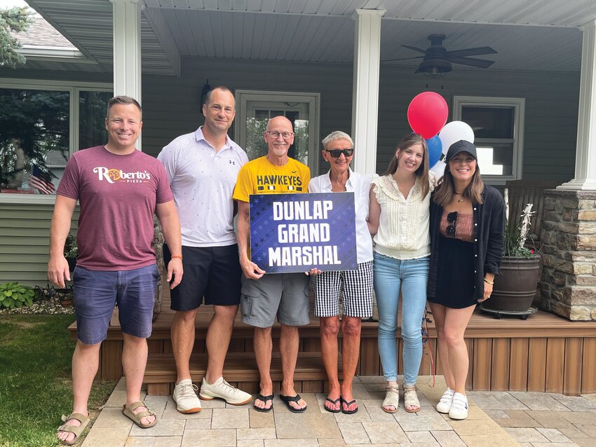 The Dunlap Fourth of July Committee surprised the Petersons with the news. Pictured, from left to right: Austin McDonald, Justin Schaben, Virgil and Gretchen Peterson, Jill Melby and Julie Elder. Committee members not pictured: Jake McAllister and Jill Schaben.