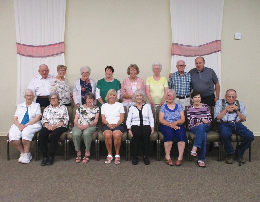 Pictured in the front row, from left to right: Liz (Allmon) Neese, Sharon (Holbrook) Neill, Judy (Hendrix) Bertelson, Gladys (Moore) Isom, Ann (Rowe) Endicott, Pat (Hand) Christians. Bonnie (Radloff) Davis and Jim Rothanzl. Back row, from left to right: Len Johnson, Jan (McElderry) Johnson, Mary Ellen (Brummer) Sedlacek, Phyllis (Peters) Watkins, Marge (Collier) Ingram, Ann (McCurley) Dowling, Bob Wilson and Don Bond. Those also attending but left before the picture were Bob Hansen and Richard Kachulis.
