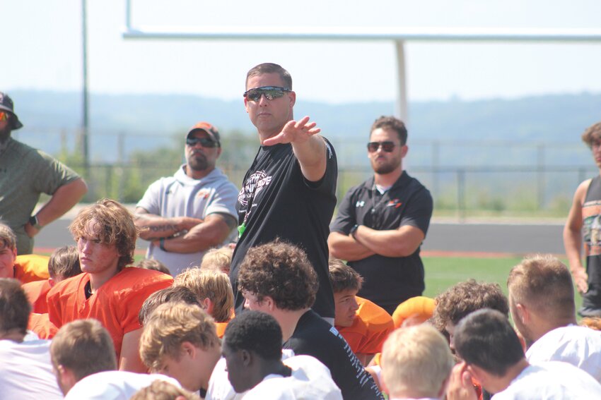 Missouri Valley athletic director Nate McDonald speaks with campers at the conlusion of last Wednesday's practice.