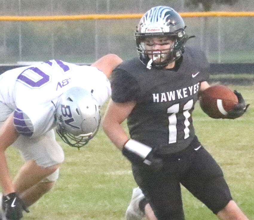 West Harrison's Jamison Martin (11) looks for a block in the Sept. 13 District 1 battle against Boyer Valley.  The Hawkeyes will be at Ar-We-Va this week.