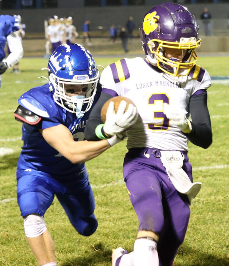 Logan-Magnolia's Kalab Kuhl (3) scores a touchdown for the Panthers in the Class A State Playoff game on Oct. 25 at Marcus.