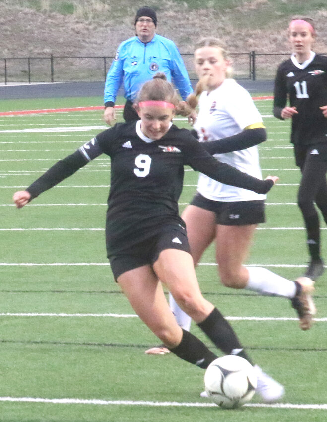 Missouri Valleys' Devon Koyle (9) takes a shot at the goal in the home soccer opener on April 1.