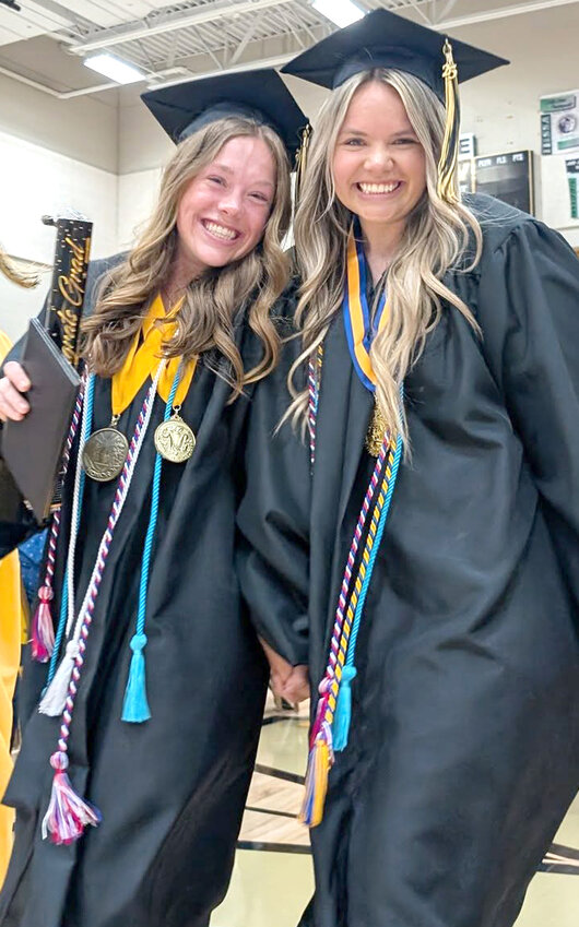 2025 Woodbine HS Grad Ceremony (May 10):  Woodbine's Charlie Pryor (left) and Elise Olson (right) are all smiles after receiving their high school diplomas on May 10 in Woodbine.