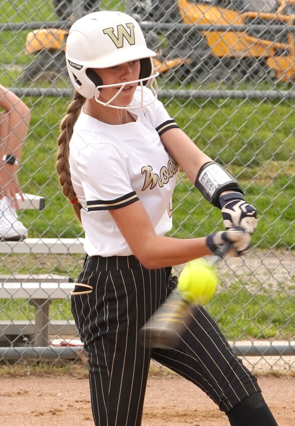 Woodbine's Vanessa Blum drives a hit into play during Rolling Valley Conference action against Ar-We-Va on June 4 in Woodbine.