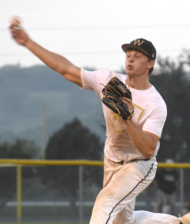 Woodbine's Micah Moores fires a pitch during Rolling Valley Conference play on June 11 in Dunlap.