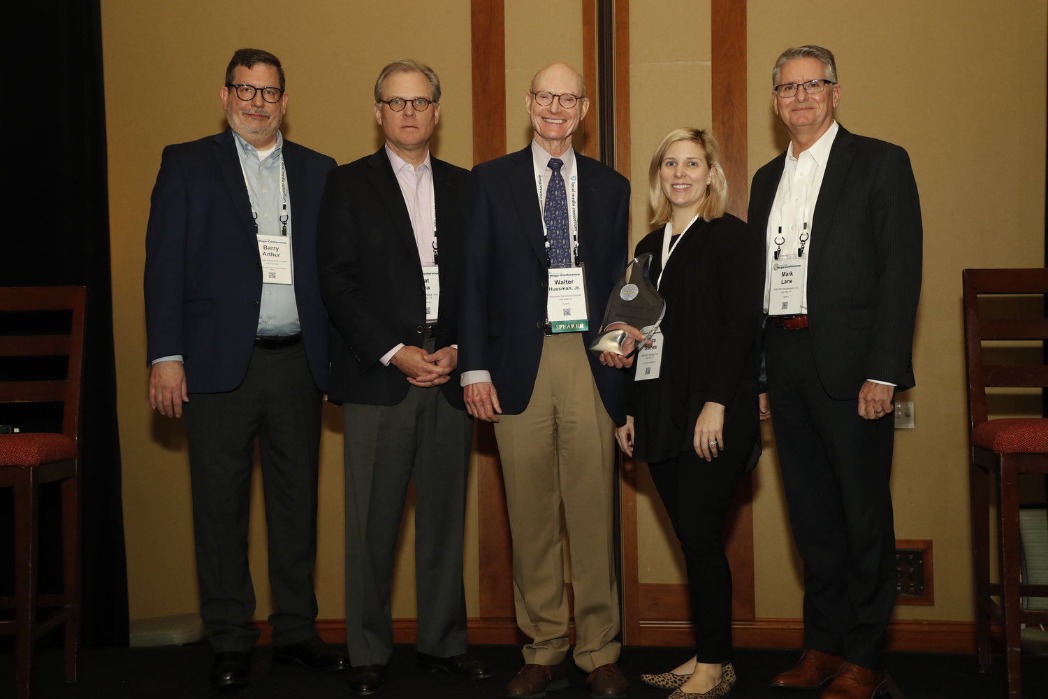 2020 Mega-Innovation Award recipient — Arkansas Democrat-Gazette. Pictured left to right: Barry Arthur, Nat Lea, Walter Hussman, Eliza Gaines and Mark Lane. (Photo by Bob Booth)