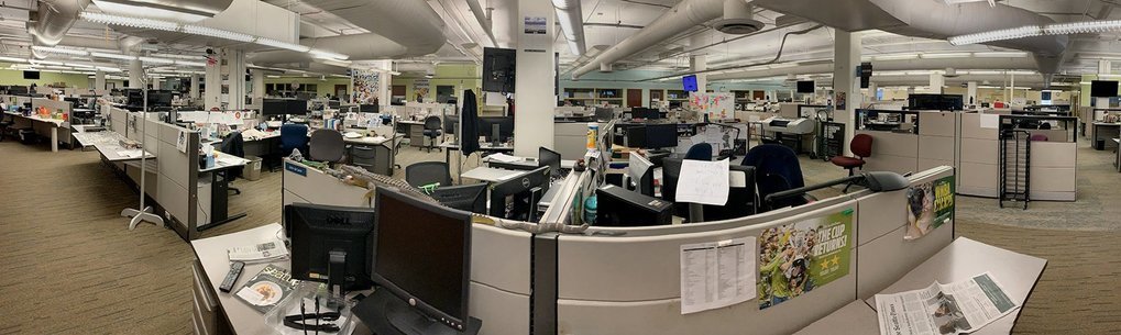 The Seattle Times newsroom is deserted Friday afternoon as staff works remotely in an effort to help slow the spread of coronavirus. (Danny Gawlowski / The Seattle Times)