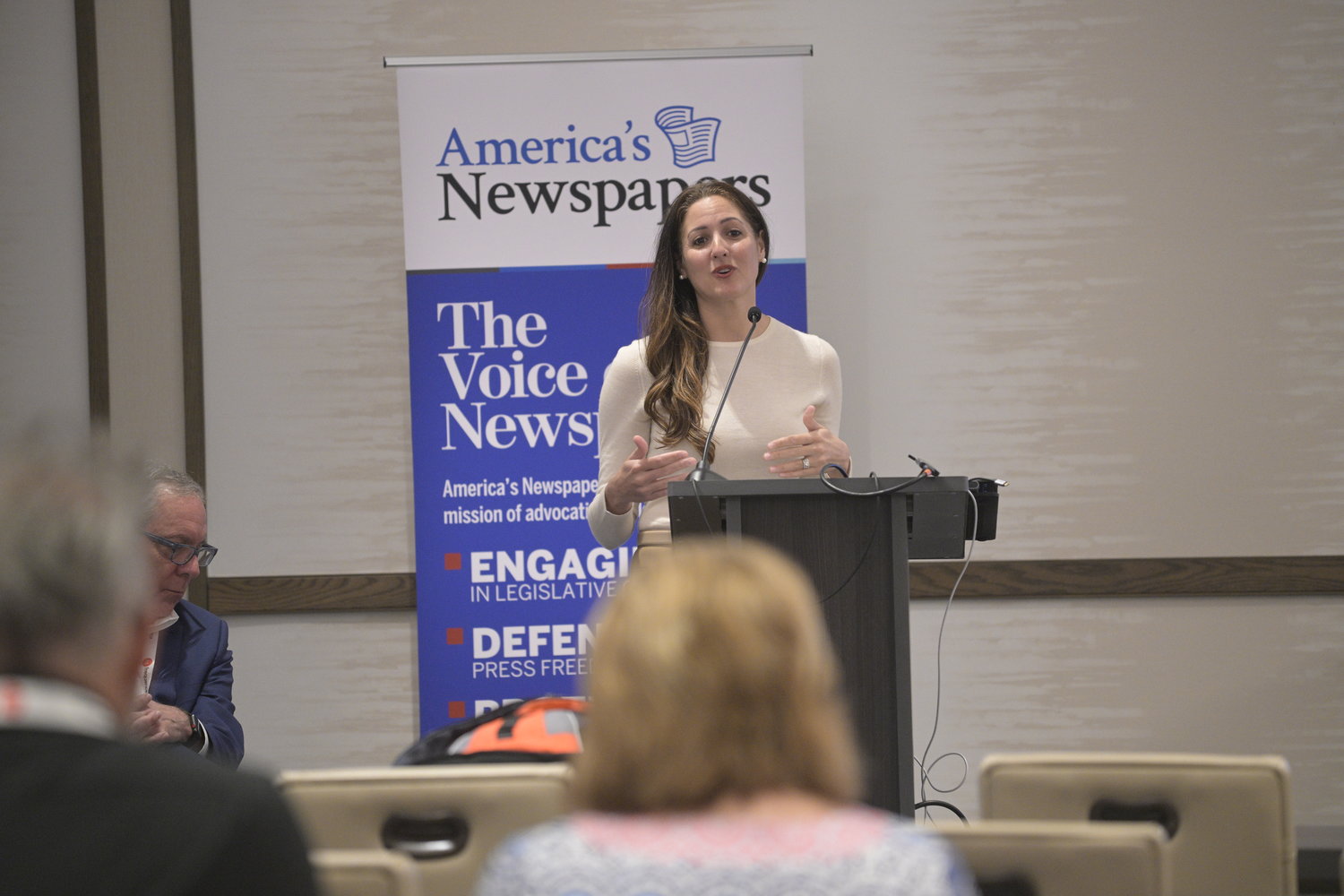 Advocating for Local Newspapers: Danielle Coffey, EVP and general counsel, News Media Alliance, addresses the Mega-Conference. (Photo by Phelan M. Ebenhack)