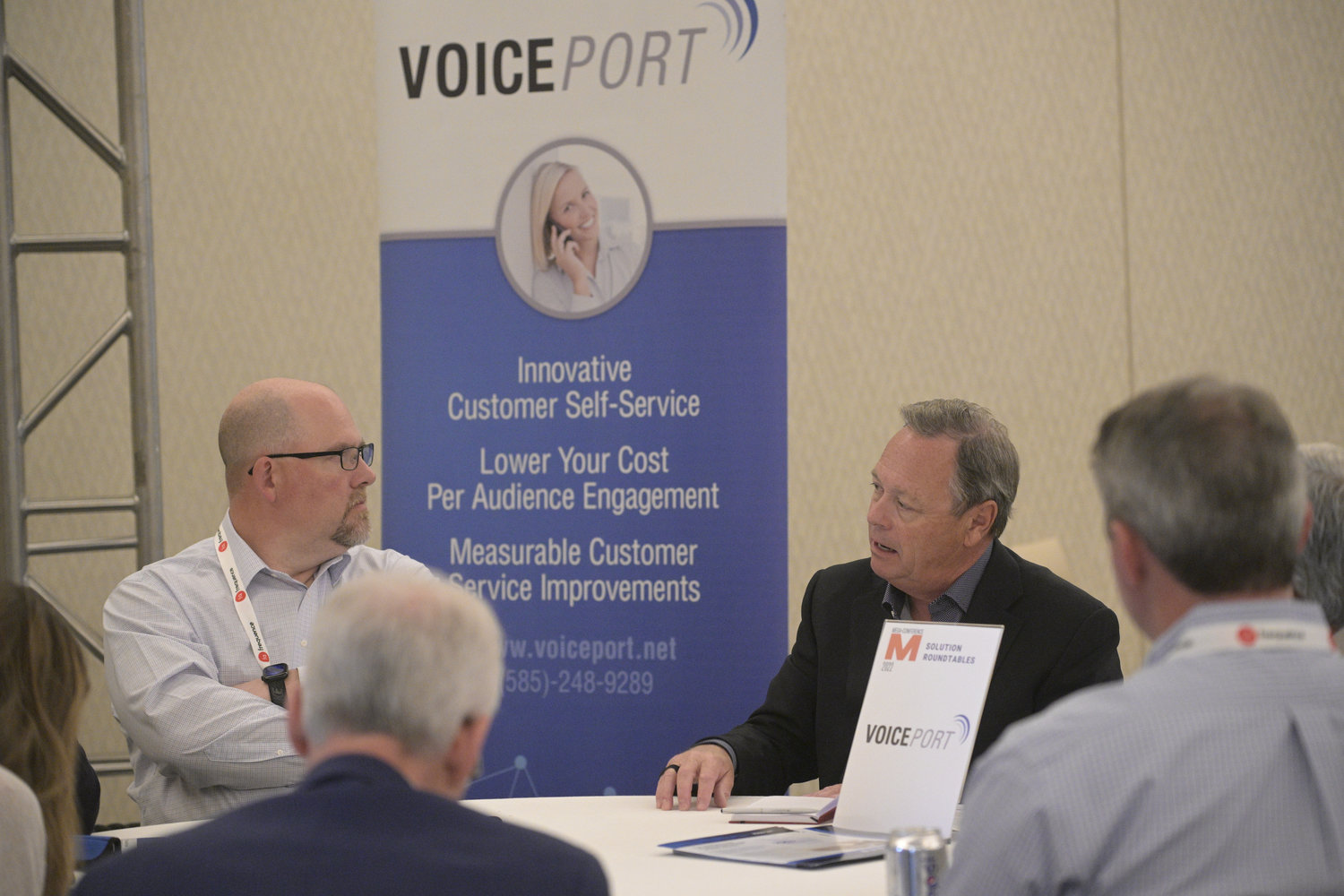 Another topic at the VoicePort table: Addressing your "open routes without swamping your call center." (Photo by Phelan M. Ebenhack)