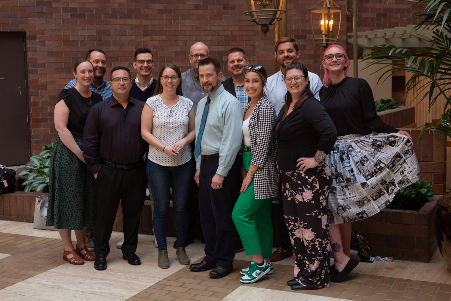 Executive Development Participants. (left to right) — Front row: Britni Tomcho, Todd Tanaka, Nicole Miller, Aaron Rother, Chantel Soranaka and Heather Kantrud. Back row: Nate Peterson, Ben Childers, Jeremy Cooley, Chris Brumfield, Hugh Osteen and Alycia McCloud.