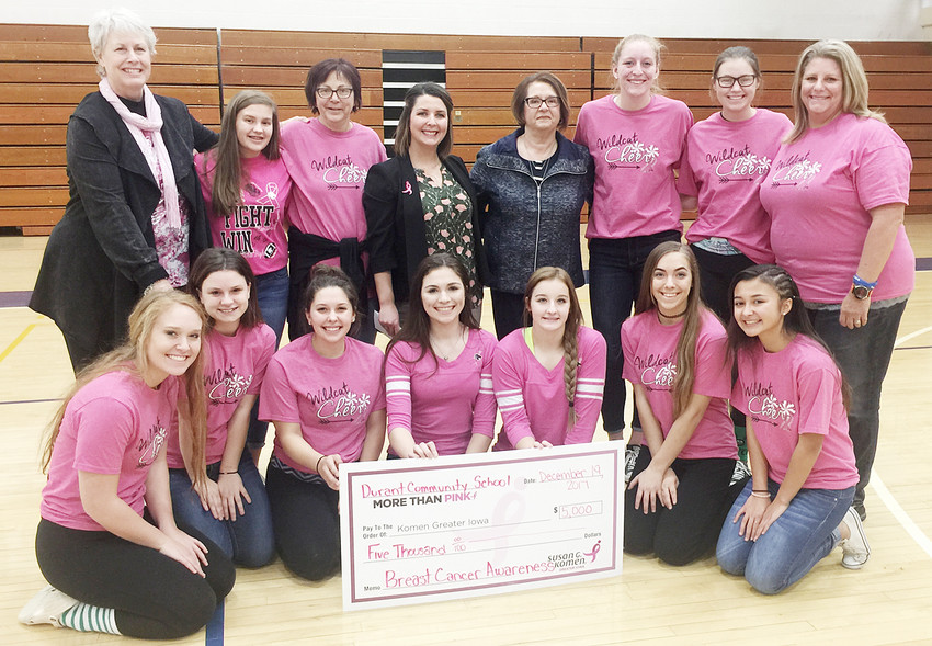 The Durant football cheerleaders, under the direction of Cheryl Prohaska, raised funds during a &quot;Cheer for the Cure&quot; night at a Durant home football game last fall. The Durant cheer squad has been holding annual fundraisers for the Susan G. Komen Foundation Quad Cities chapter. A check for $5,000 was donated to Susan G. Komen earlier this year, bringing the grand total to $25,000 donated from Durant High School. Pictured above (front from left) includes Sierra Gregoire, Mariah Miller, Lily Bassett, Madison Willkomm, Morgan Russell, Addisyn Skinner and Ellie Berry; back row, Komen ambassador Terri Reinartz, Laura Stineman, Cheryl Prohaska, Executive Director of Komen Greater Iowa Jenny Brinkmeyer, cheer team co-chair Barb Goettig, Justine Badtram, Kerrigan Johnson and Kristy Badtram.