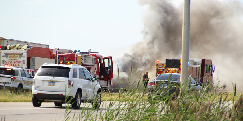 Firefighters attack a truck fire on eastbound I-80 near Walcott, 2:45 p.m., Sunday, Aug. 30, 2020.