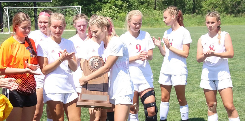 Faces told the story after North Scott received its state tournament trophy following the quarterfinal loss to Norwalk. From left: Natalie Knepper, Mackenzie Bohr, Reagan Schoening, Brooklyn Bullock, Faith Rains and Adeline Finnicum.
