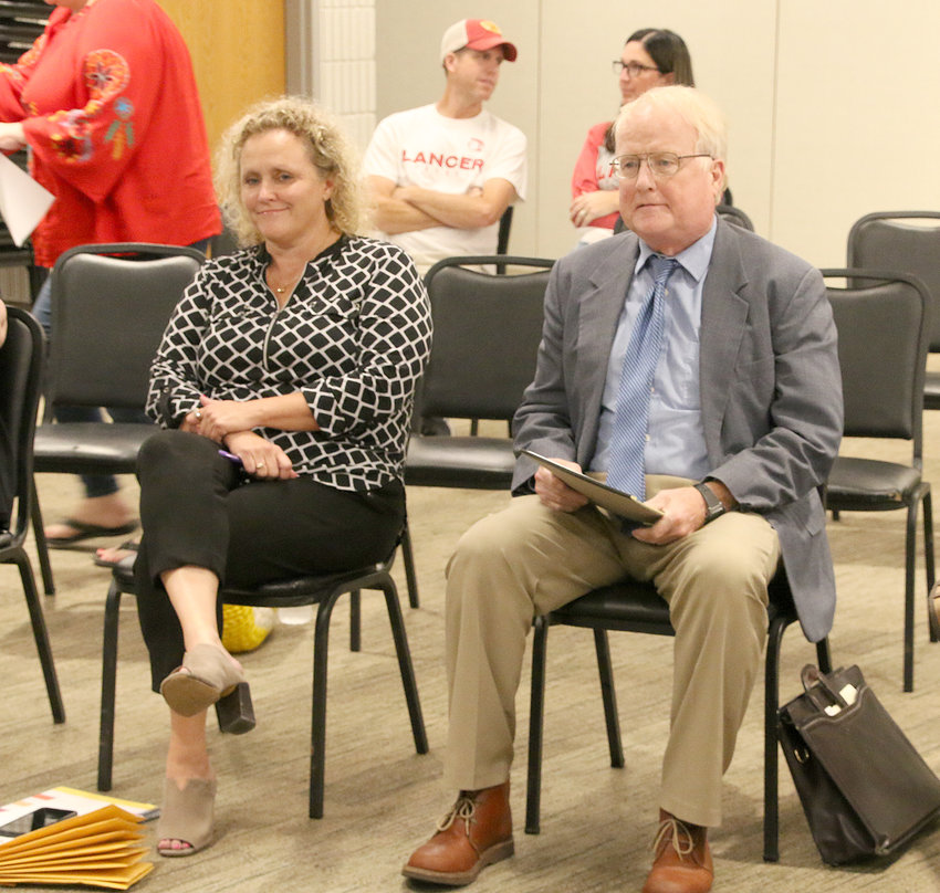Eldridge city administrator Lisa Kotter, and her attorney, Mike Meloy, at the Sept. 20 council meeting.