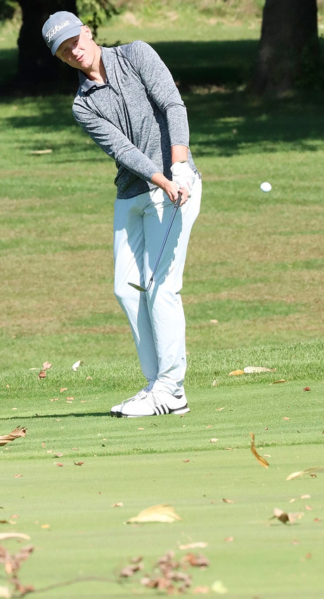 North Scott junior John Dobbe battled wind and flying corn husks to card an 81 on Friday. Dobbe finished seventh overall.