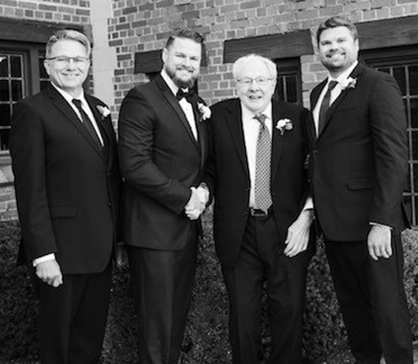 Wayne Meyer, second from right, is pictured with his son, Chris (far left), and grandsons Jarod and Brandon.