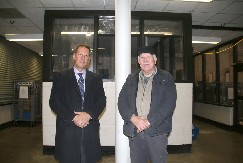 Scott County sheriff Tim Lane and former sheriff Dennis Conard at the Tremont Avenue warehouse.