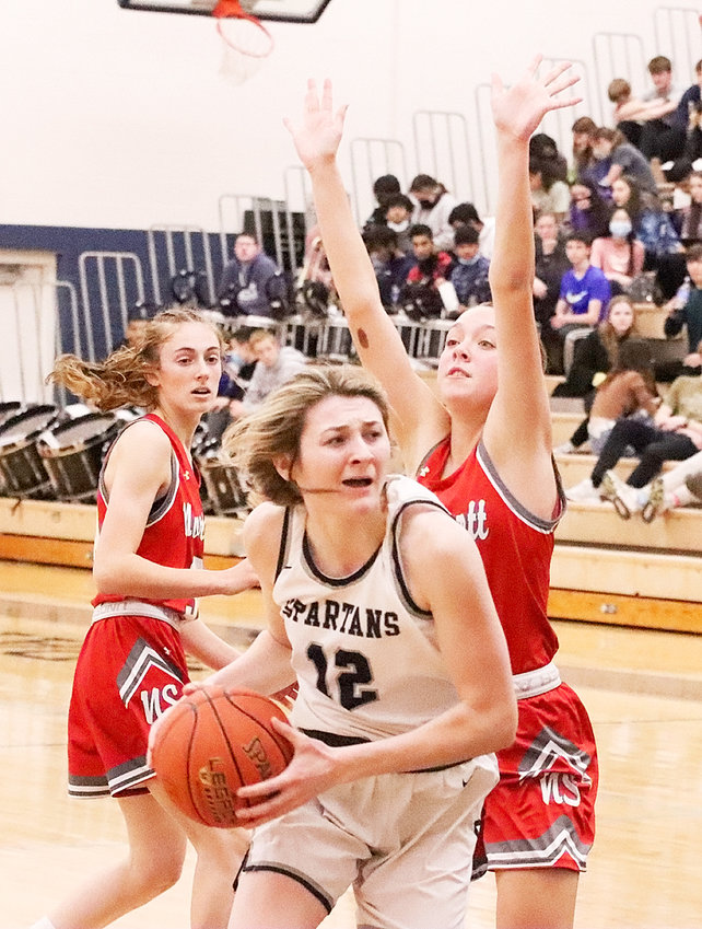 Lancer junior Lexi Ward did her best to stop Spartan star Halle Vice, but the junior still finished with 24 points.