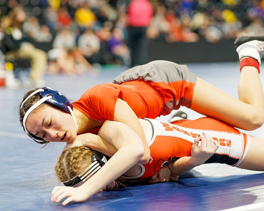 North Scott junior Khylie Wainwright made history by becoming the first Lancer girl to bring home a top-six finish at the girls' state wrestling tournament.