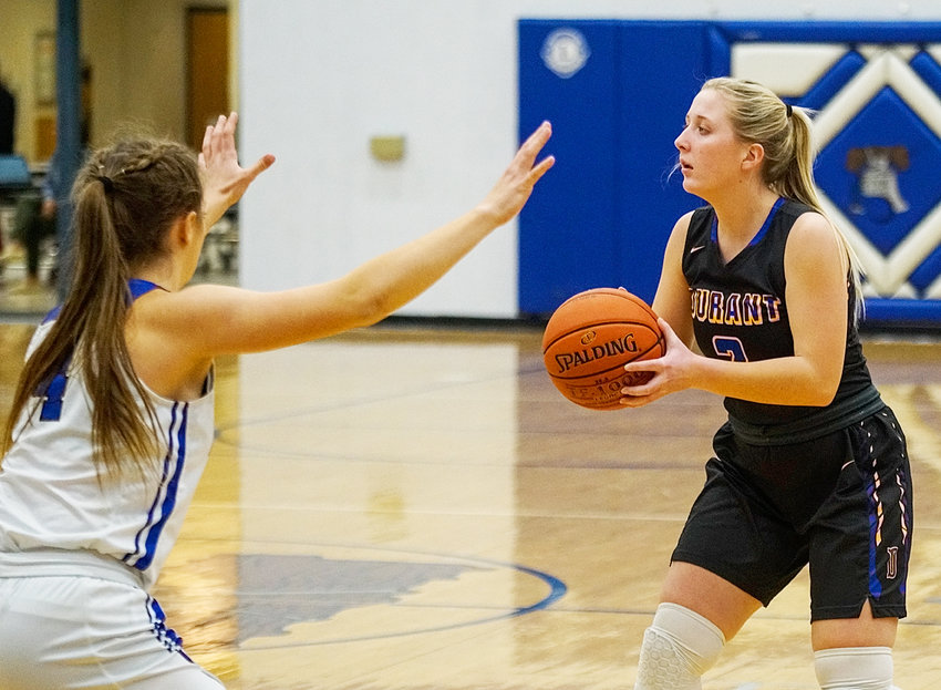 Kylie Schult sets up Durant offense.