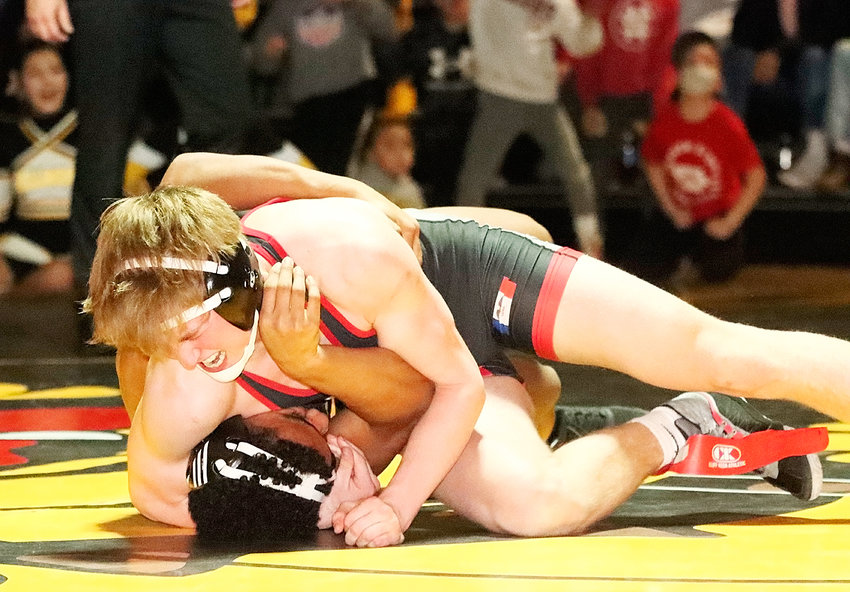 North Scott fans turned out in force for the Regional dual at Bettendorf on Wednesday (Feb. 16), but there wasn't a whole lot to cheer about, other than junior Dylan Marti's come-from-behind win at 160 pounds, over state-ranked Elijah Mendoza, which brought Marti's coaches and teammates to their feet.
