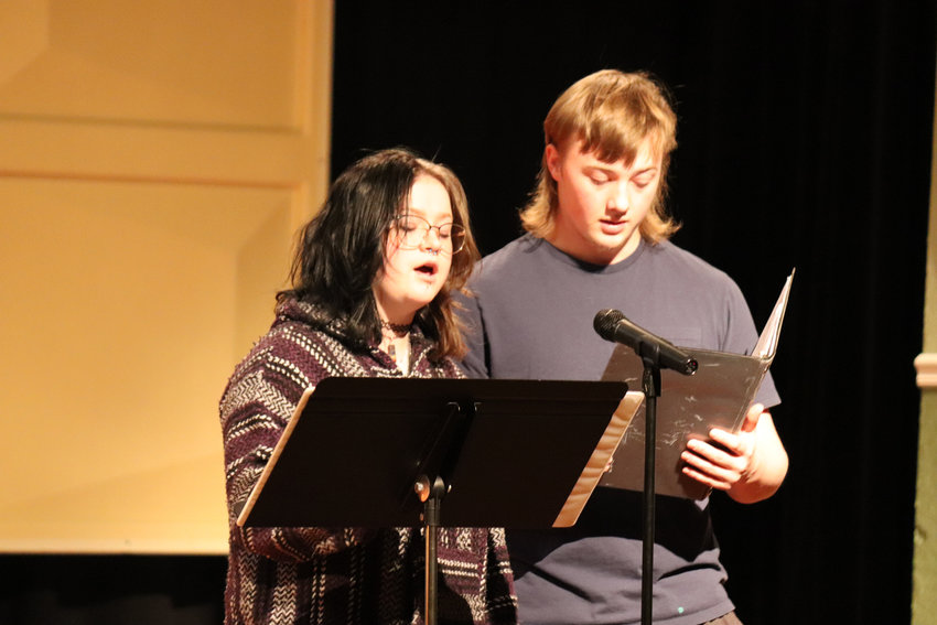 Isabell Mathes and Christian Durham rehearse on the Durant auditorium stage.