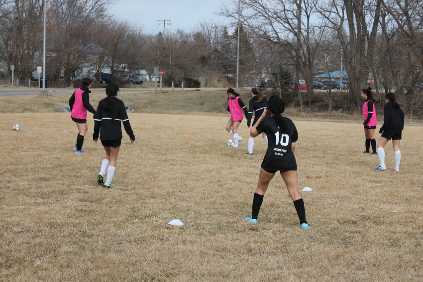 Comet girls soccer team at practice this week.