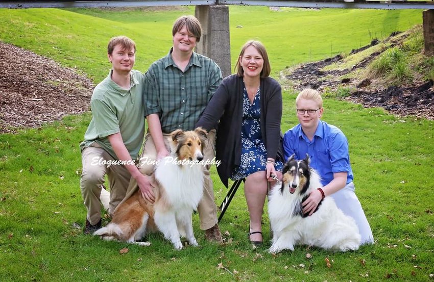 Meet the Levsen family including, from left, Dennis, Greg, Xiomara and Dustin Levsen.  In front is Gizmo and Callie.