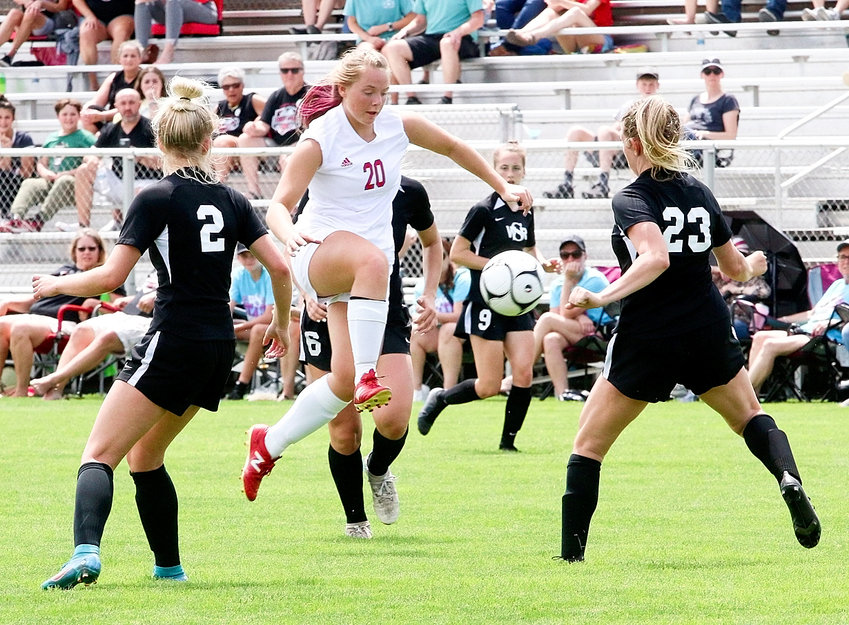Sophomore Delaney Fitzgibbon sparked the Lancers up front in the second half, and was oh-so-close to connecting on this shot between a pair of Waverly-Shell Rock defenders.