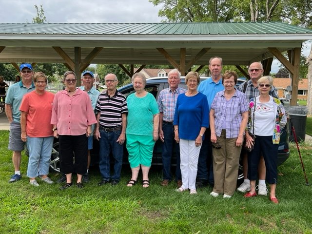 Relatives of Joey Gehrls gather August 8 for the shelter dedication. Pictured are Gary and Vicki Neuman, Terri and Jerry Clark, Ron and Judy Bierkamp, Don and Karolyn Kleppe, Randy and Janet Gehrls, Lowell Gehrls and Madonna Sagers.
