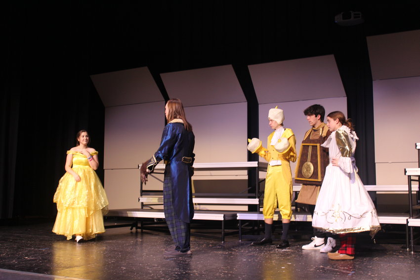Early in the performance, Beast Jacob Imloff confronts Princess Bell in a scene during dress rehearsal Sunday evening.