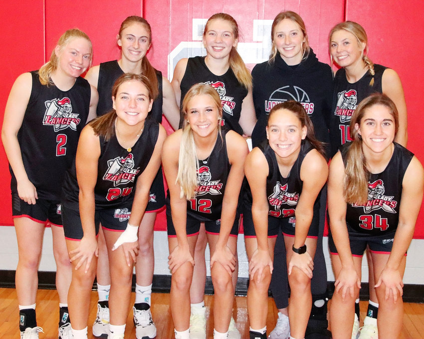 North Scott's girls' basketball team is loaded with experience this season, and return seven girls who have started varsity games over the past two  years. Front (l-r): Abby Rouse, Bailey Boddicker, Lexi Ward and Kendall Knisley. Back: Hattie Hagedorn, Syd Skarich, KK Farnum, Lauren Golinghorst and Cora O'Neill.NSP photo by Scott Campbell