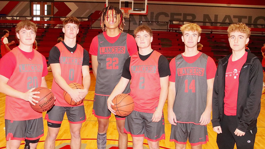 McLaughlin era officially tips off at North Scott | North Scott Press