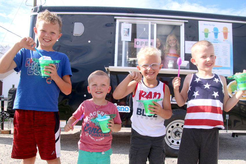 Graeme, Ryland, Kohen, and Emerson Reimers enjoy a treat from Eldridge Tropical Sno, July 2, 2022.